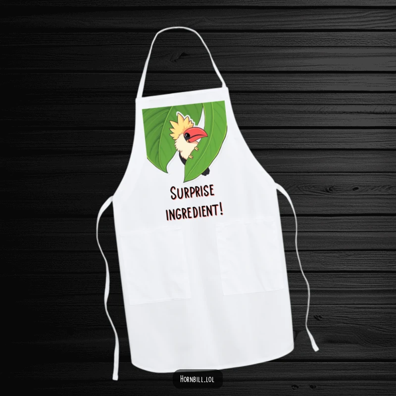 Funny chubby hornbill peeking from behind a big green leaf, adding a playful and humorous element to this kitchen apron.