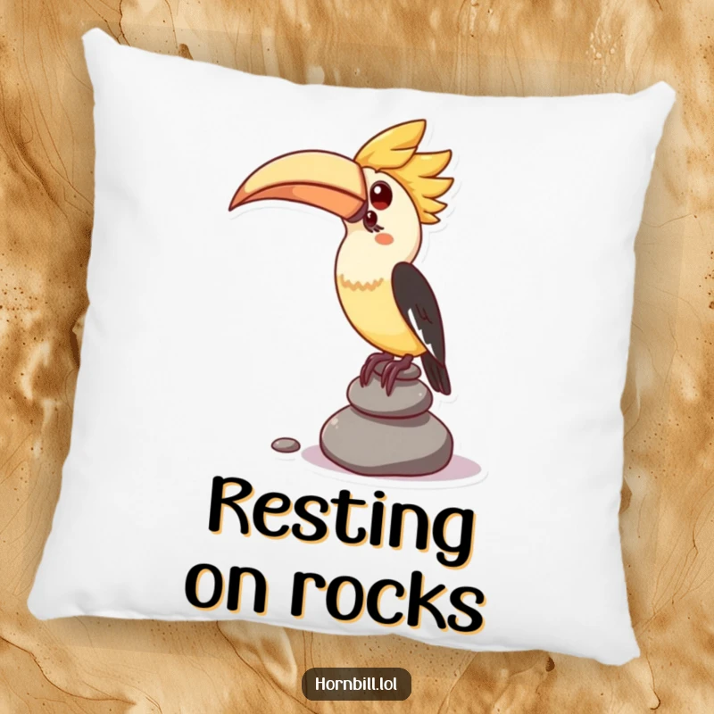 Funny pillow with a kawaii hornbill character attempting to balance a stack of small pebbles, offering comfort and charm.