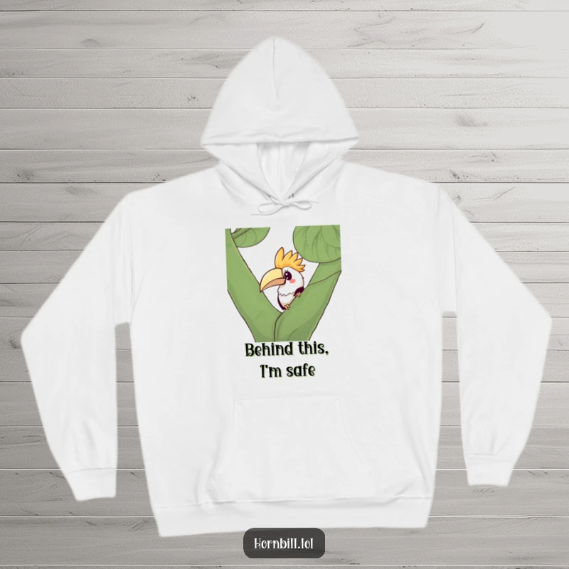 Funny Kawaii Hornbill Hoodie showing a curious bird peeking from behind a large green leaf, perfect for cozying up.