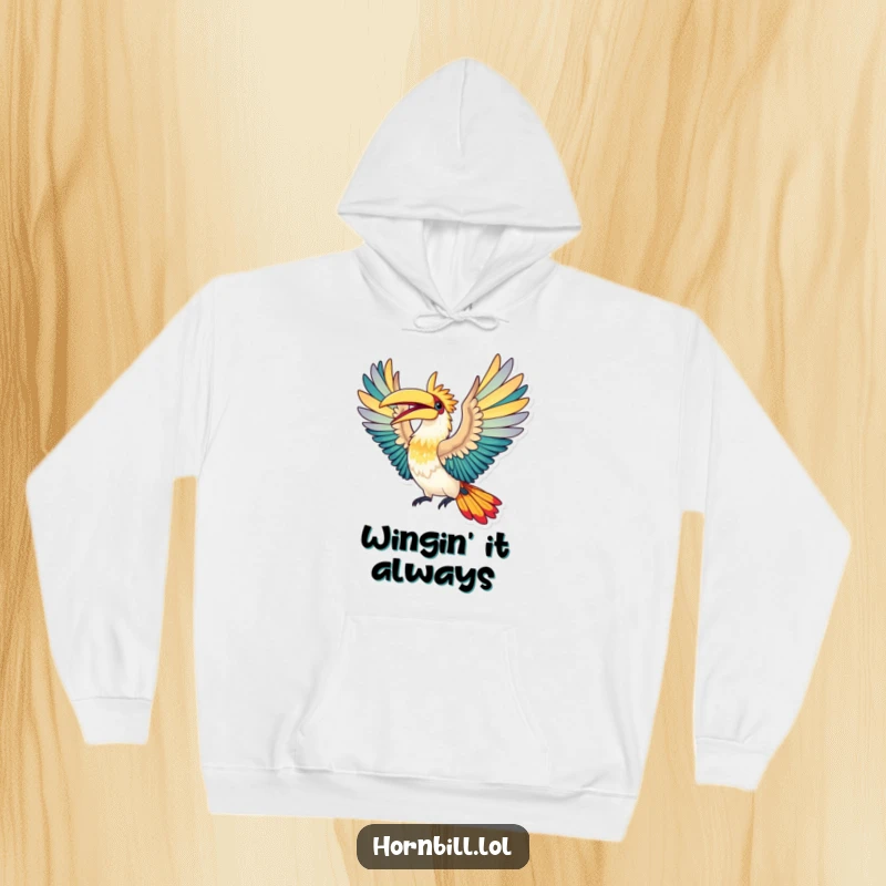 Funny Hoodie: Soft, warm hoodie featuring a hornbill bird with vibrantly spread wings, captured mid-flight in joyful ascent.