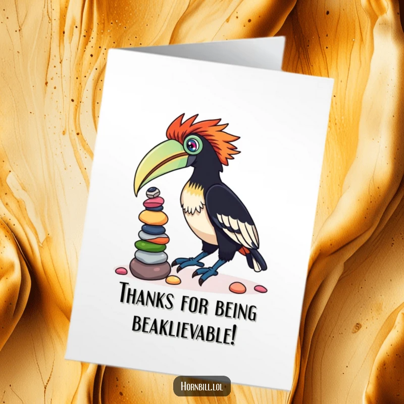 Funny Free Printable Thank You Card: A quirky hornbill wobbling with a precarious stack of colorful pebbles, expressing sincere thanks humorously.