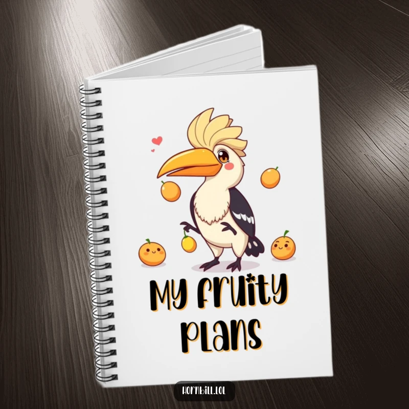 Funny hornbill juggling three fruits with a playful expression, making this notebook a vessel of creativity and fun.