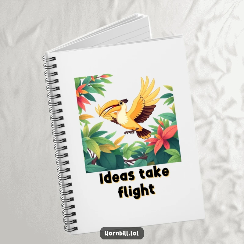 Funny notebook cover showing a happy hornbill bird soaring with wings outstretched through a vibrant, leafy green canopy, inspiring creativity.