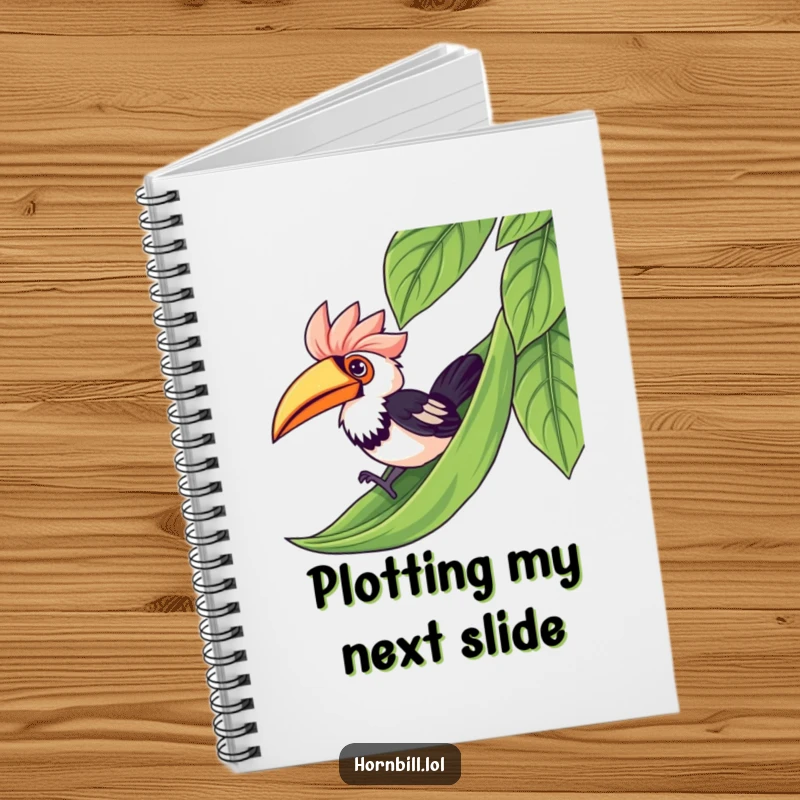Funny kawaii hornbill enjoying a leaf slide, making this notebook a vessel of humor and creativity.