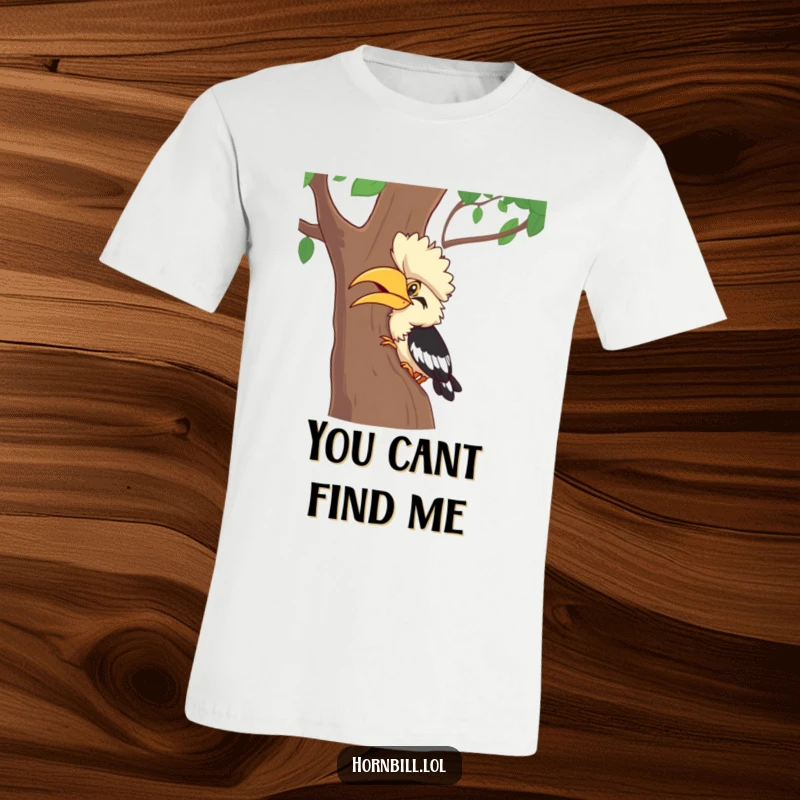 Funny Hornbill T-Shirt: A joyful hornbill character giggling intensely while playing hide-and-seek behind a tree, a funny gift.