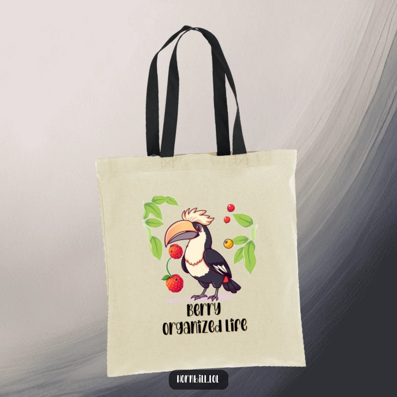 Funny hornbill tote bag illustrated with a playful bird juggling two ripe berries, ideal for shopping or carrying daily items with a smile.